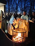 Benedictine monks around an Easter fire prior to Easter Vigil mass in Morristown, New Jersey