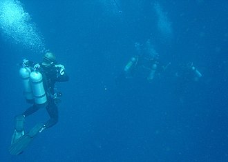 Technical divers at a midwater decompression stop
