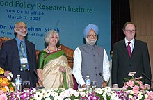 Dr. Ahluwalia with former Indian Prime Minister Dr. Manmohan Singh at the inauguration of the New Delhi office of the International Food Policy Research Institute.