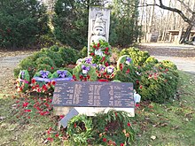 Statue with a plaque