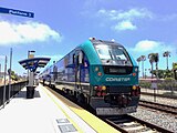 Right: A COASTER Siemens SC-44 Charger locomotive at Oceanside Transit Center.