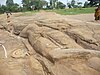 Anantashayana Vishnu carved in sandstone in the riverbed