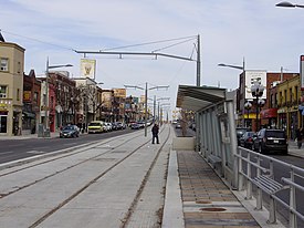 Looking east on St. Clair Avenue West in Corso Italia in 2009 with the nearly completed streetcar right-of-way in the centre