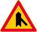 Junction with a minor road (formerly used )