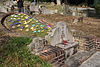 Five coloured papers on a grave mound, Bukit Brown Cemetery, Singapore - 20110326-01.jpg