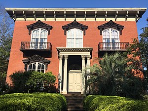 Every window of the Mercer House (in Savannah, Georgia, U.S.) is crowned with a cast-iron hood moulding.
