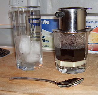 Vietnamese iced coffee ready to be stirred, poured over ice, and enjoyed