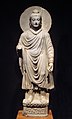 A sculpture fashioned in the Gandharan tradition depicting Gautama Buddha, founder of Buddhism, at the Tokyo National Museum