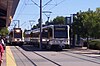 Two CAF-built trainsets on the Sacramento light rail system, passing at Mather Field/Mills station in 2006