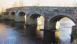 A stone bridge across a river