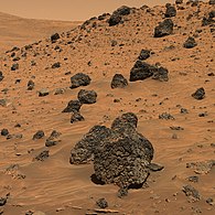 Martian sand and boulders photographed by NASA's Mars Exploration Rover Spirit (April 13, 2006)