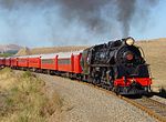 New Zealand Railways 4-8-2 locomotive JA1271 with excursion consist climbing the Opapa incline - 16 February 2003