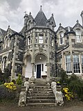 Scots baronial turret above entrance to The Kirna, an 1867 Ballantyne property in Walkerburn, Scottish Borders.