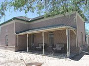 The Harvey-Niemeyer House was built in 1880 and is located in 250 (once 1613) S. Main St. Physician William Harvey was known as an "Angle of Mercy" during a smallpox epidemic and was on scene at the aftermath of the 1888 Pete Gabriel-Joe Phy shootout. Later resident Charles Niemeyer was Clerk of the Pinal County Board of Supervisors for 25 years and also served as local postmaster. Listed in the National Register of Historic Places on August 1, 1986, reference #86002627.