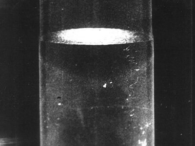 Superfluid phase at temperature below 2.17 K. In this state, the thermal conductivity is extremely high. This causes heat in the body of the liquid to be transferred to its surface so quickly that vaporization takes place only at the free surface of the liquid. Thus, there are no gas bubbles in the body of the liquid.