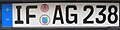 美军在德国驻军所属车辆使用的车牌。以德国车牌为基础设计，但是本应为欧盟旗帜的图案被替换为北大西洋公约组织旗图案以及德国的国家代码被替换为USA（美国的国名缩写）字母