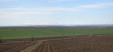 View across the Danubian Plain (Bulgaria) towards the central Balkan Mountains 90 km away