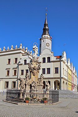 Reconstructed town hall and a Marian column on the main square