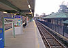 The track and platform at Chappaqua station with the historic station on right