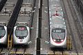 一列屯马线列车正于八乡动车段进行调试，左方为港铁近畿川崎列车