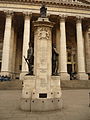 London Troops memorial, Royal Exchange behind (western side, front view looking east)