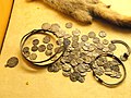 6 Islamic, 15 English, and 76 German coins, latest coin dates from 1006 to 1029 - National Museum of Finland