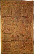 6th-8th century Coptic wall hanging or carpet, decorated with flowers, human faces and heraldic eagles
