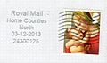 英国2013年圣诞节邮票（已盖销），标记为“1st”，图案为圣母玛利亚及圣子。