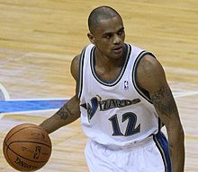 Juan Dixon playing during a game as a member of the Washington Wizards