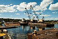 View of tugs and barges at Moody Fabrication.