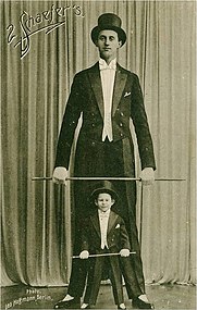 Nacken 17 as circus acrobat with a young boy assistant