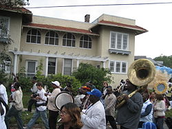 A second line parade on Fontainebleau Drive