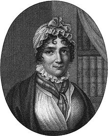 Engraving of woman, showing her head and shoulders. She is wearing 19th-century clothing and a white cap. A bookshelf is in the background.