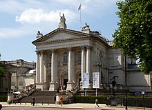 exterior of neo-classical public building with columns and portico