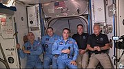 ISS and Demo 2 crews after hatch opening