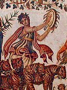 Maenad playing a tympanum. Detail from the Triumph of Dionysus, on a Roman mosaic from Tunisia (3rd century AD)