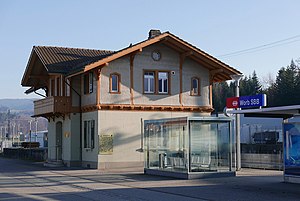 Two-story building with gabled roof