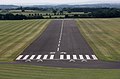 A view of runway 24 at RAF Cosford, Shropshire, UK, whilst on final approach in a Grob Tutor T1 of UBAS.