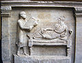 Image 43Slave holding writing tablets for his master (relief from a 4th-century sarcophagus) (from Roman Empire)