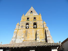 The bell tower of the church, in Bouillac