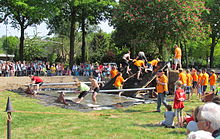 Water game around a pit in Amsterdam