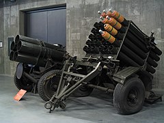 A 21 cm Nebelwerfer 42 on display next to its Allied rival, the Land Mattress