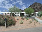 The White Gates Residence was built in 1964 and is located in 5202 Saddle Road on the corner of White Gates Drive in the southern end of Camelback Mountain. In 2009 it was listed in the Arizona Historic Properties Endangered list. It is listed as Historic by the Phoenix Historic Property Register.