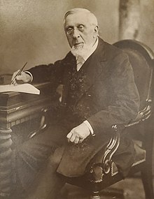 Portrait of Wilhelm Nast sitting down