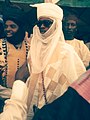 A teenage Hausa boy wearing traditional cloths