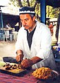 Image 11A man makes plov, the national dish of Tajikistan. (from Culture of Tajikistan)
