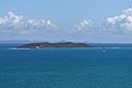 Isla Palomino seen from East, the coast of Fajardo in the background