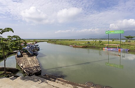 Original – The dock at the tourist attraction Kampoeng Rawa, which connects to Lake Rawa Pening through a canal. This image is illustrative because it shows just how close Kampoeng Rawa is to the lake, which has been the source of controversy.