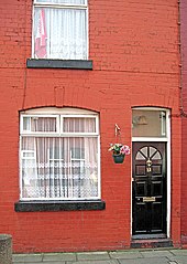 Harrison's first home, a red brick building