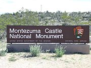 Entrance sign of the Montezuma Castle National Monument which is located near Camp Verde, Arizona. The sign and its contents are the work of an employee of the Bureau of Land Management. Montezuma Castle National Monument is listed in the National Register of Historic Places, reference #66000082.